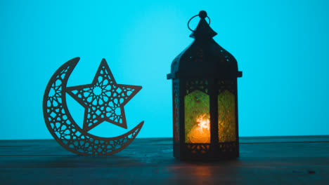 Tracking-Shot-of-Lantern-and-Symbolic-Star-and-a-Crescent